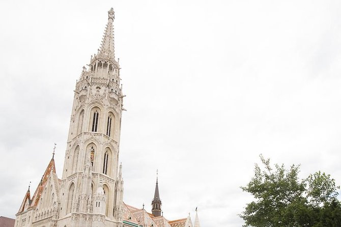 Buda Castle District Walk with Entry to Matthias Church - St Stephen statue and the gates: small stops that teach you how the city works