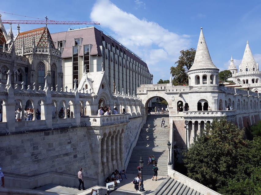 Budapest: Buda Castle Walking Tour & Folk Music Performance - Starting at Holy Trinity Square: a quick setup that saves time