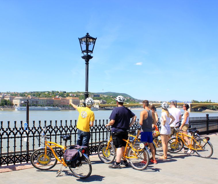 Budapest: Danube River Views Bike Ride - Into Buda: Margit Bridge, Ottoman-era context, and hillside energy