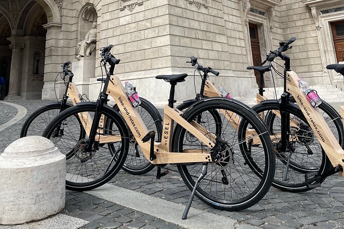Budapest: Historic Downtown ride on E-Bicycles Buda & Pest - City Park highlights: Vajdahunyad Castle and Széchenyi Baths from the outside