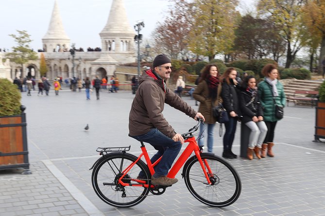 Budapest: Historic Downtown ride on E-Bicycles Buda & Pest - Back across to Pest: Gellért area, Liberty Bridge sunsets, and the Central Market Hall