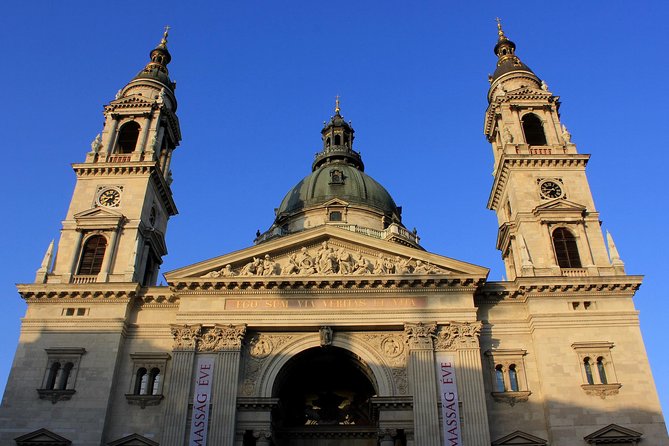 Budapest: Night Walking Tour with Danube River Cruise - Szabadság Square: the wide-open moment before the icons