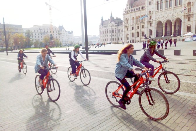 Budapest relaxed bicycle tour at sunset - Parliament from the river: huge scale, no ticket needed