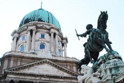 Castle District tour with Matthias Church Ticket & Cake & Coffee - Buda Castle Grounds: From Medieval Origins to Baroque Power